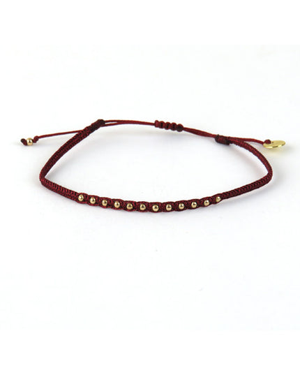 Fin Bracelet tissé main Rouge avec Billes en Or - LeJu